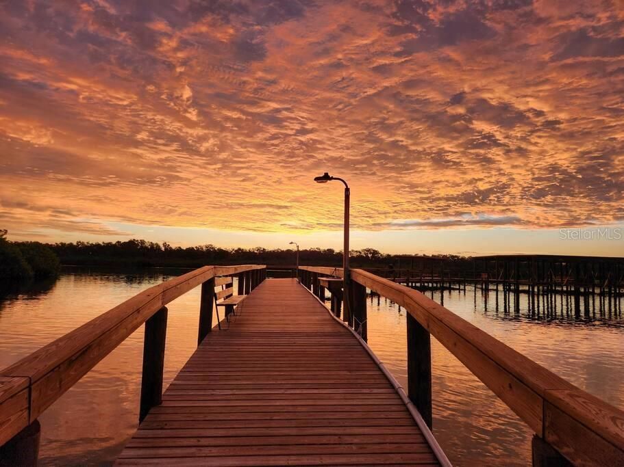 Community fishing pier at sunrise