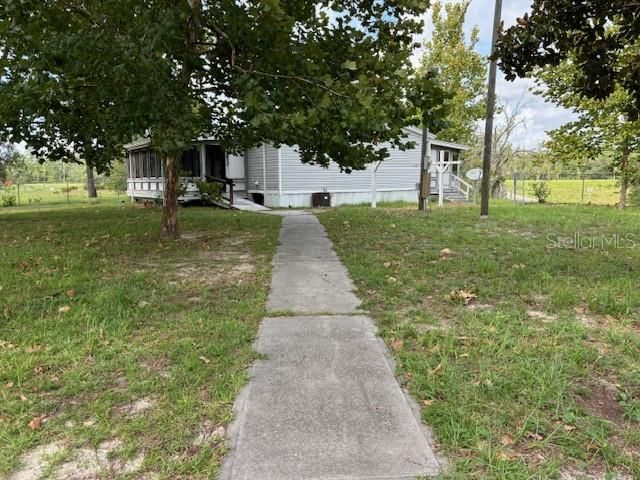 sidewalk leads to home