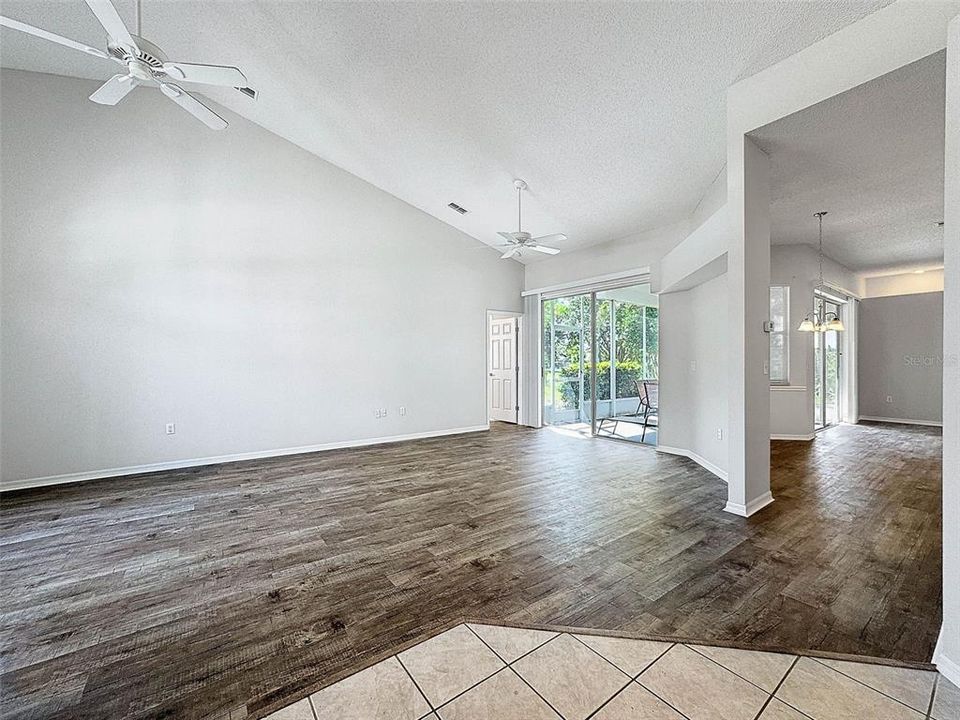 Entry view to living room and breakfast nook