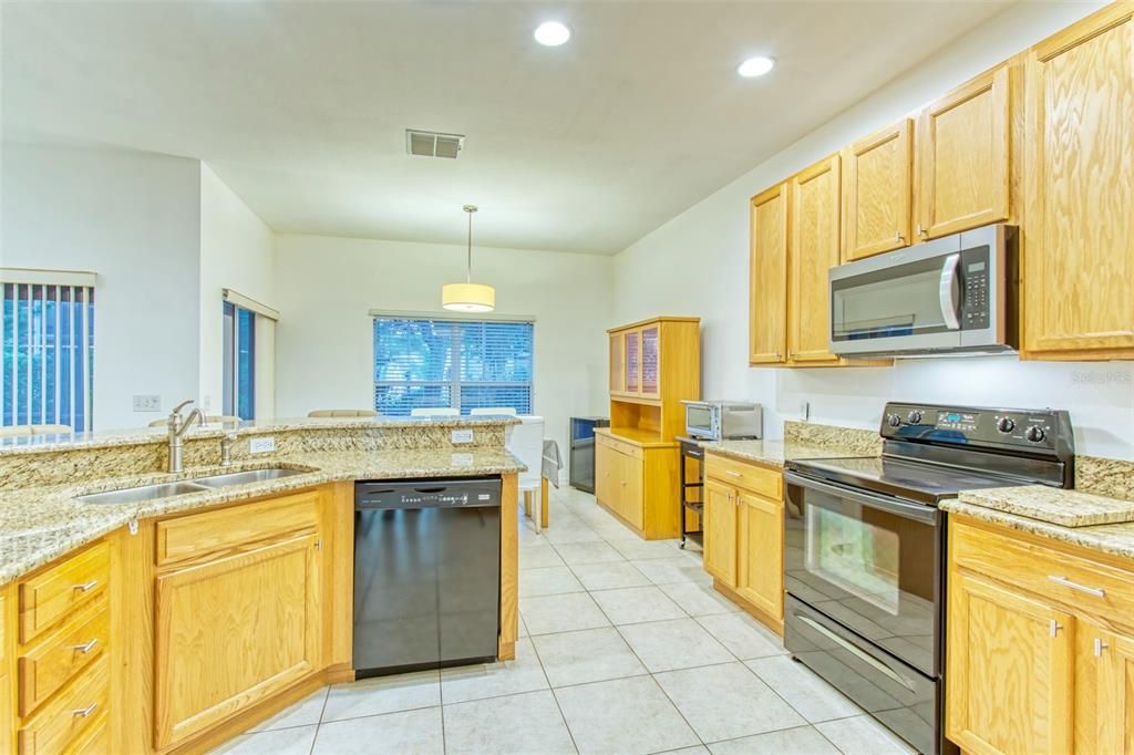 Crisp and bright! The kitchen and dining space have also been recently painted! MOVE IN READY!