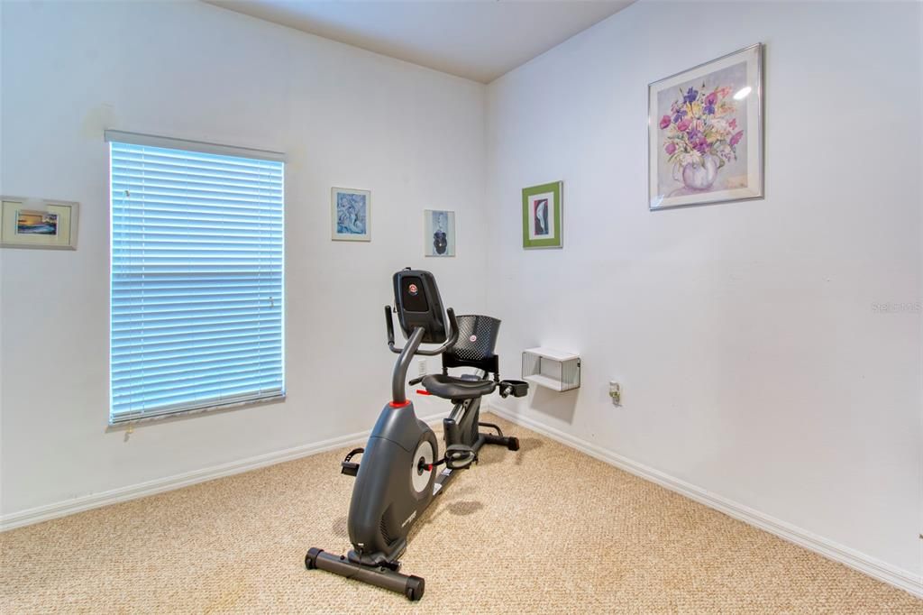 The 2nd bedroom was being used by the owner for exercise items, but it's large enough for a queen size bed, and benefits with it's own walk-in closet!