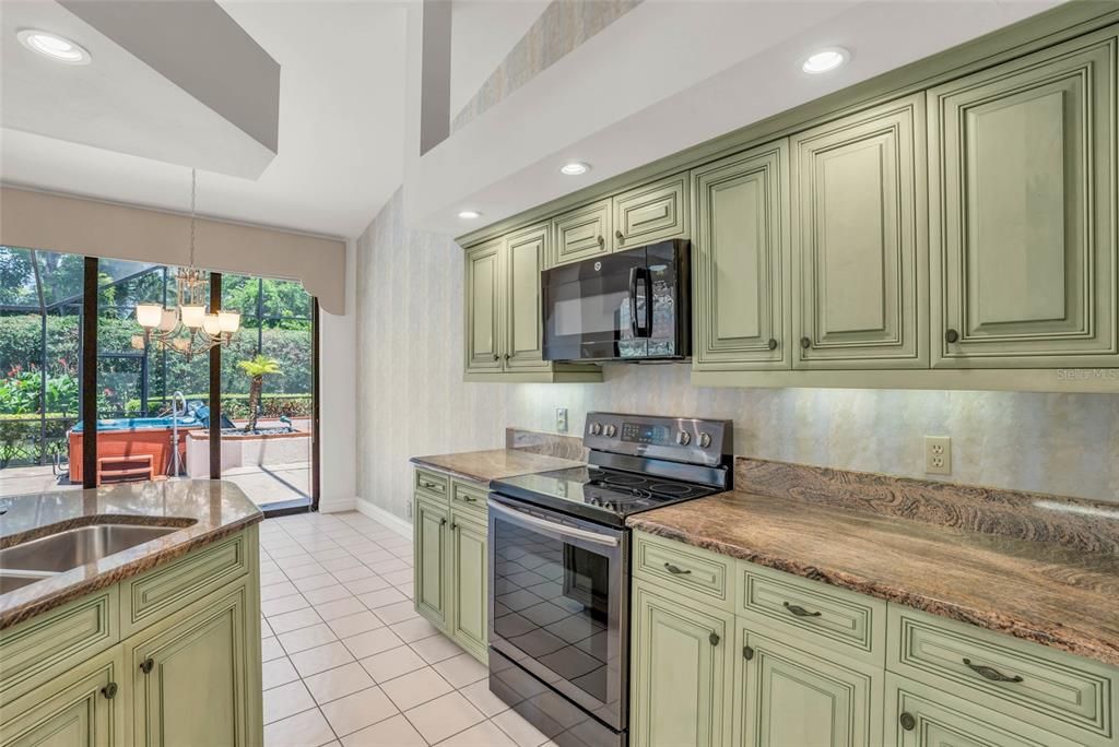 Kitchen with granite countertops and stainless steel appliances