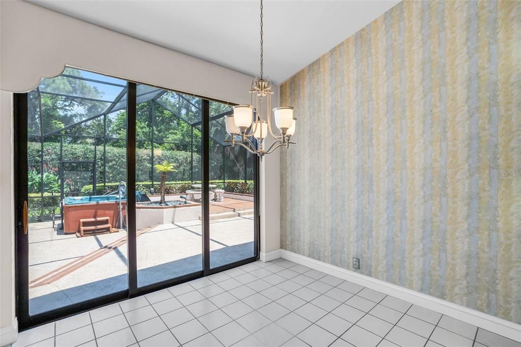 Tiled entryway with views to living area and natural light