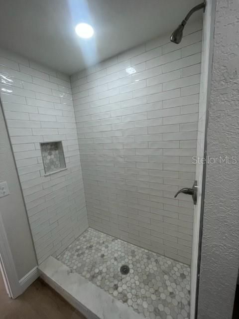 Beautiful shower, new tile