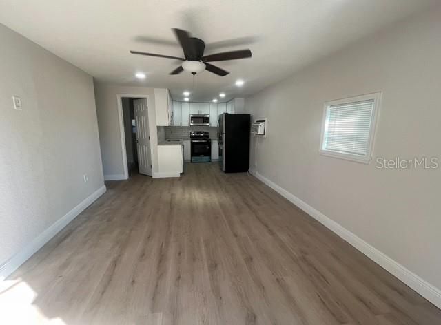 Living room area shown vacant