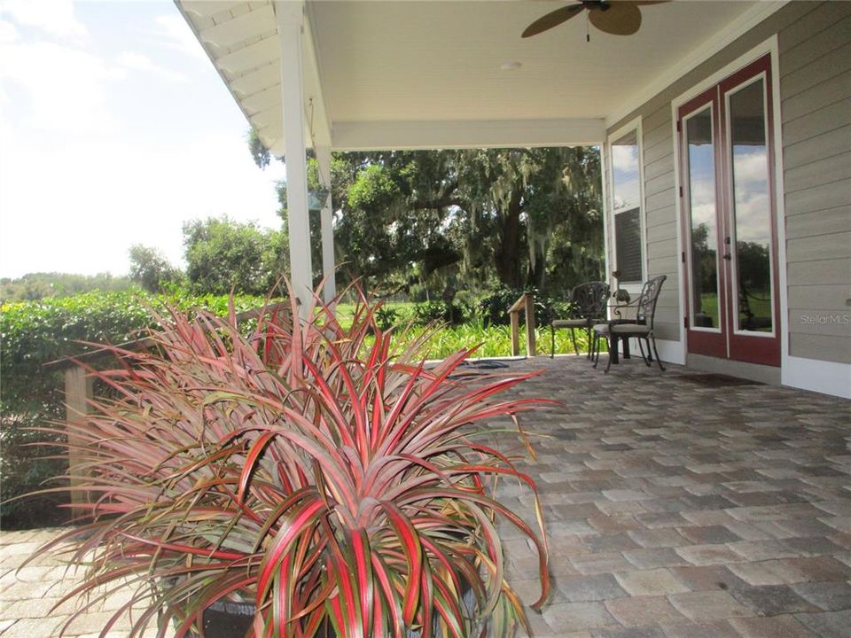 BACK PORCH IN FRONT OF GUEST HOUSE