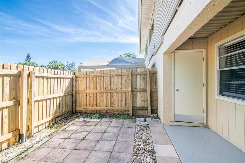 Fenced Patio Area w/ storage closet