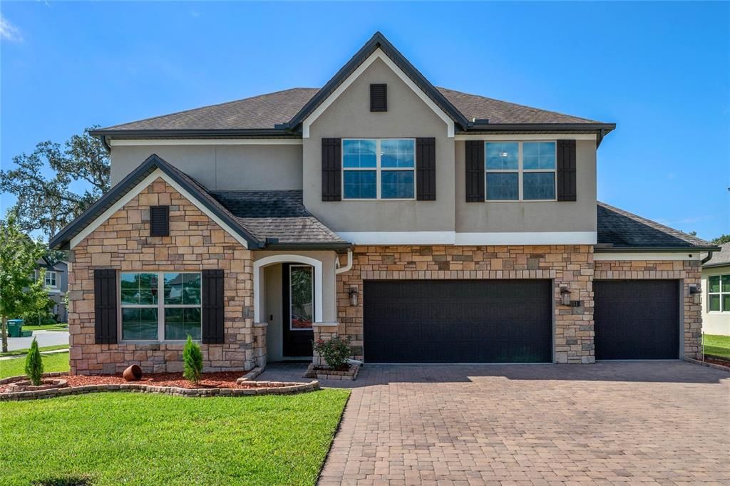 Beautiful Home w/ Stone Front & 3-Car Garage.