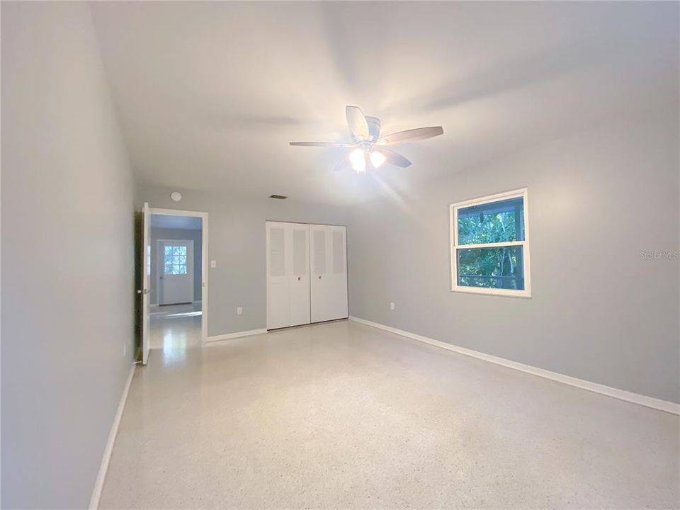 Small walk-in closet in primary bedroom