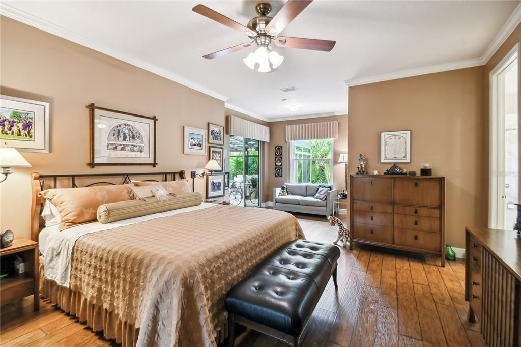 PRIMARY BEDROOM WITH HARDWOOD FLOORS