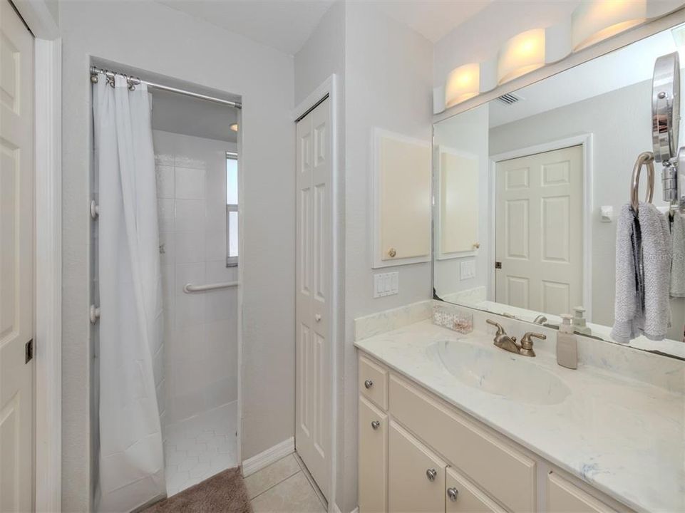 Primary Ensuite Bath With Walk-In Shower & Linen Closet