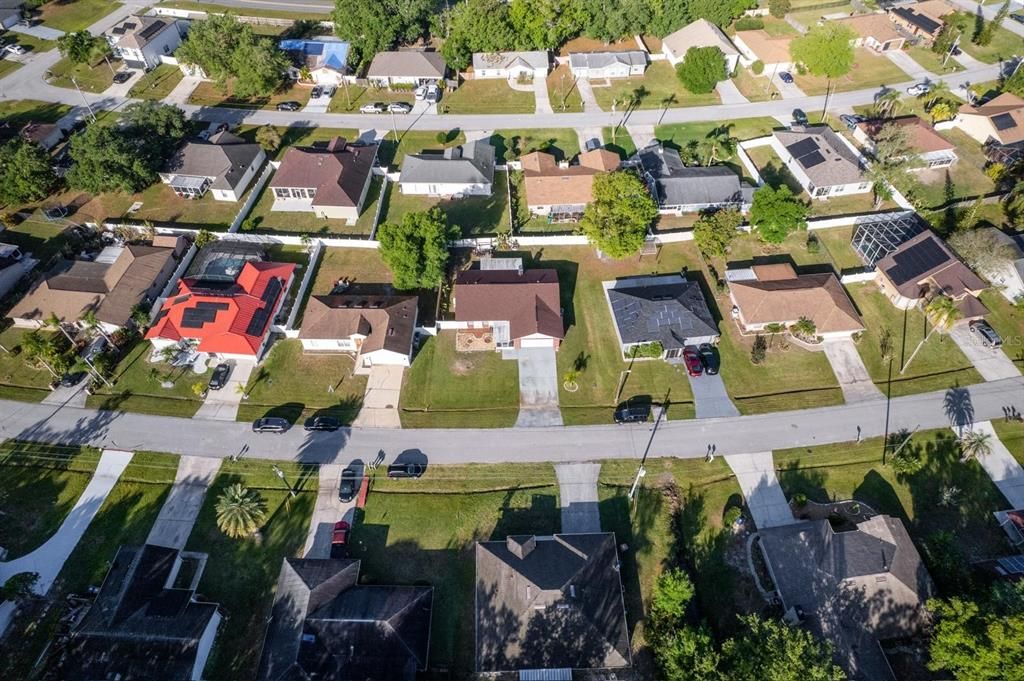 Aerial view of the property and neighborhood