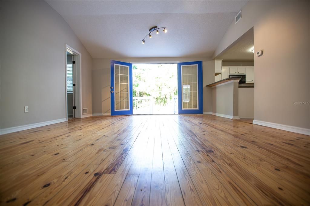 Living Room w French Doors leading to rear patio