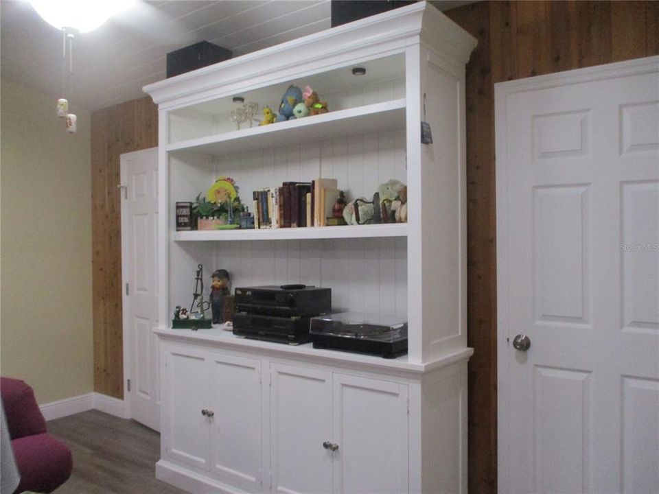 ARMOIRE IN LIVING ROOM