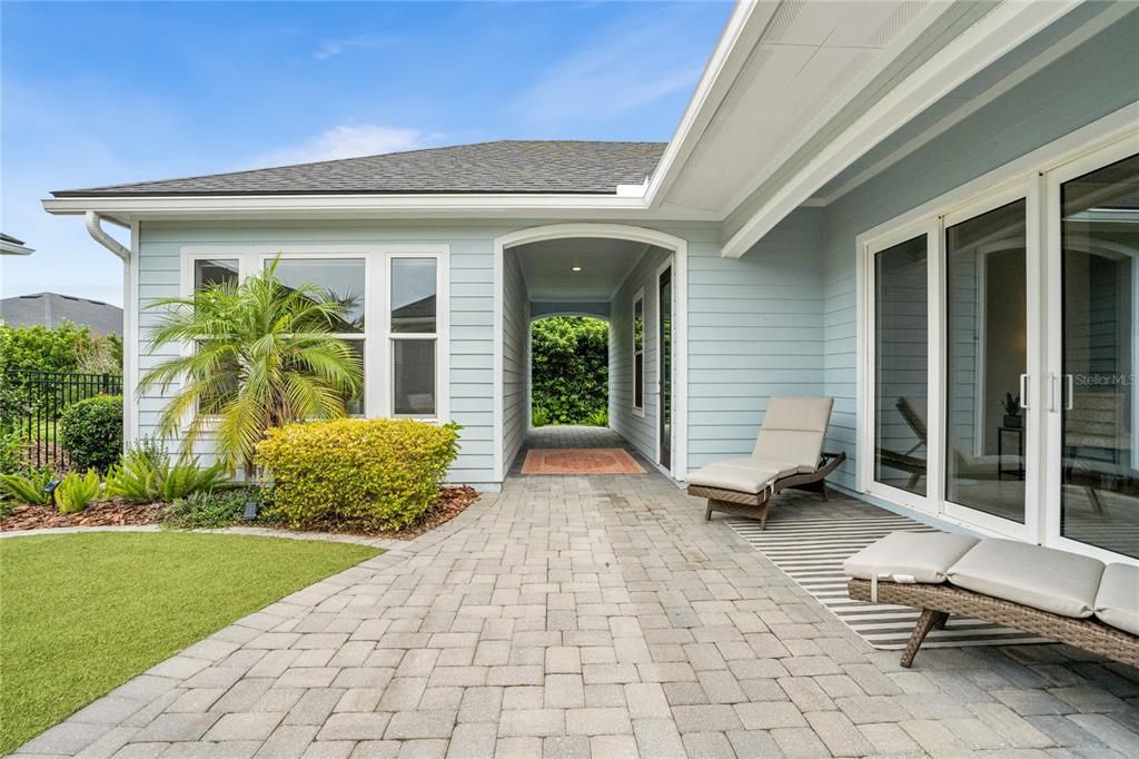 Leading to the 4th master suite and backyard