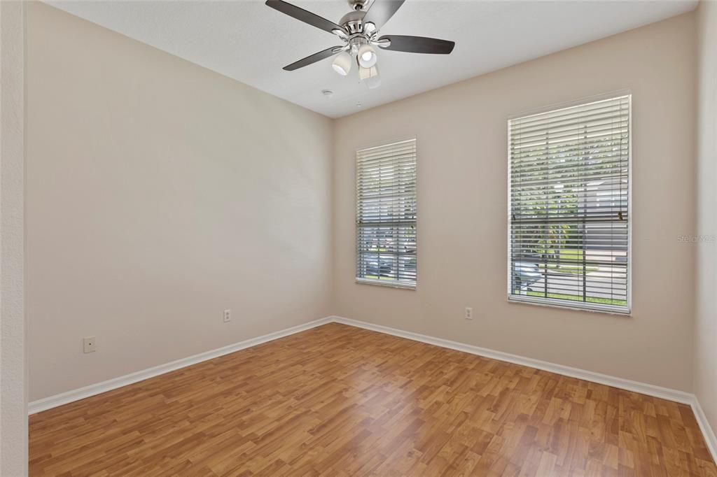 Neutral walls and flooring thru-out and ceiling fans in each bedroom