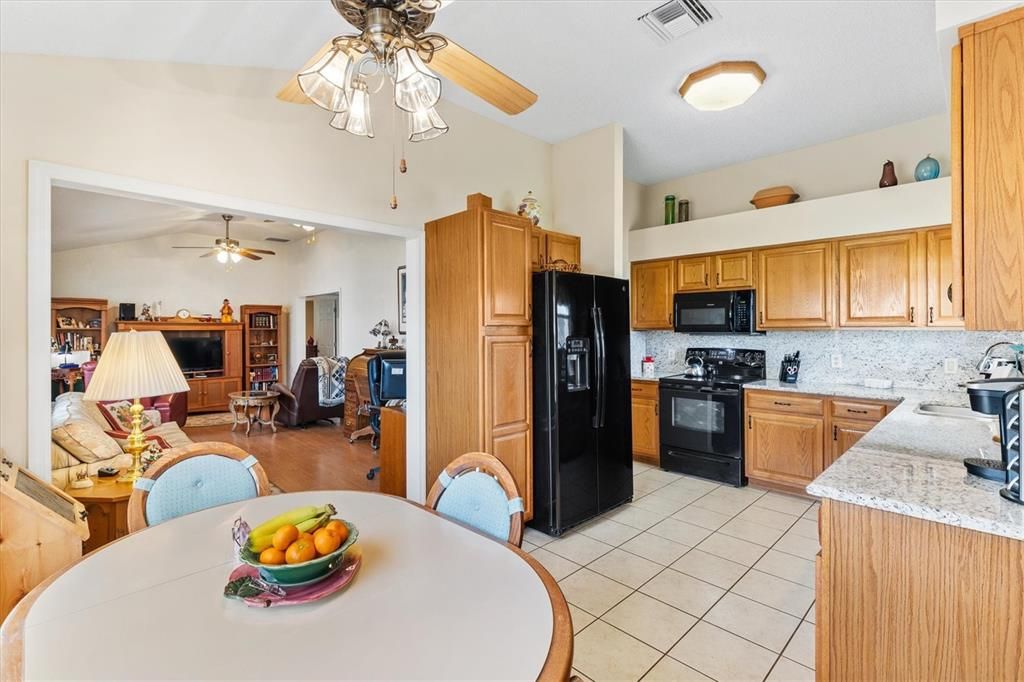 KITCHEN EAT IN NOOK LOOKING TOWARDS FAMILY ROOM