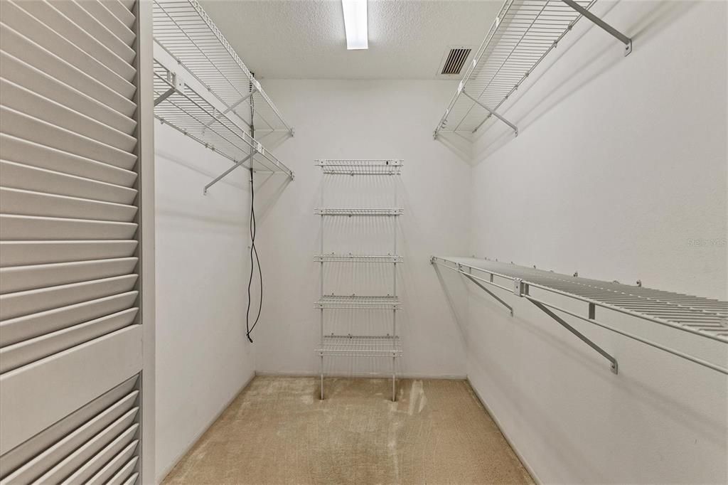 large walk-in closet in master