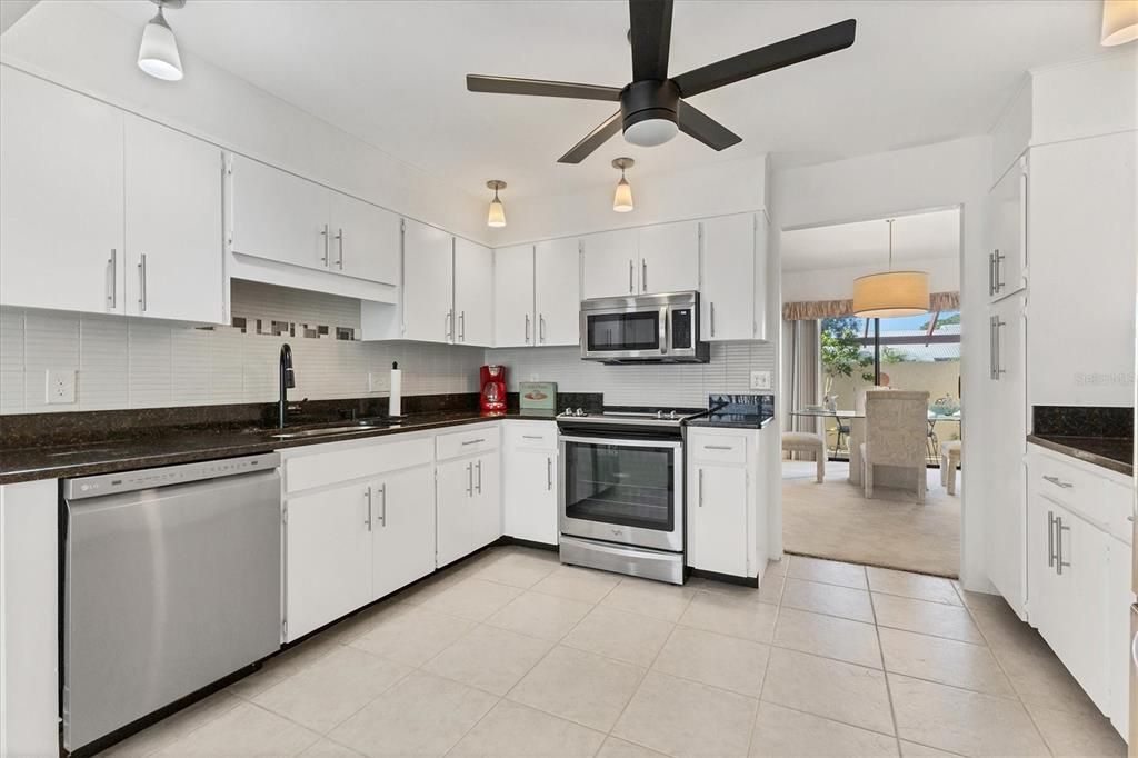 large updated kitchen with stainless appliances