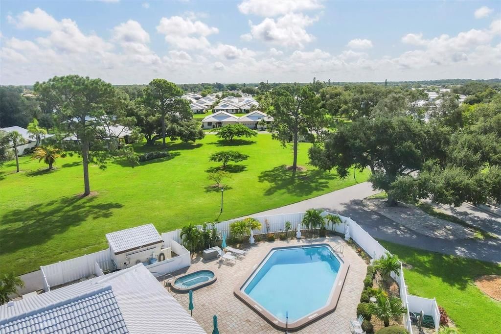 Community pool across the large green expanse in your front yard