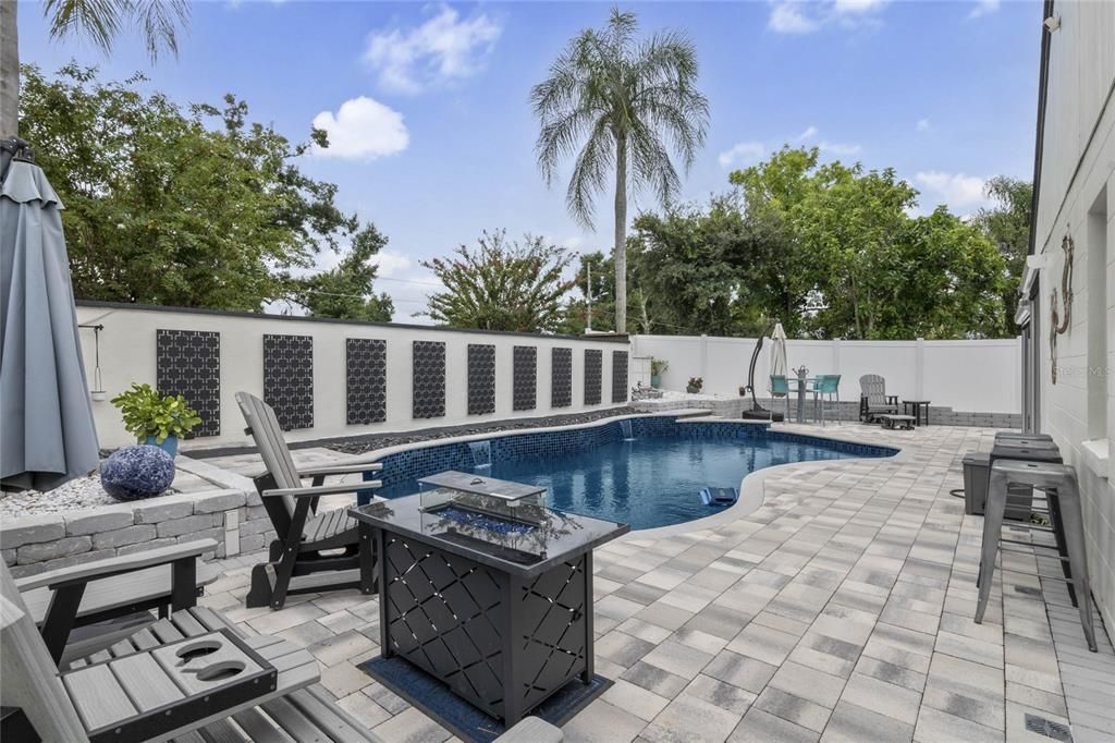 salt water pool with lighting and water features