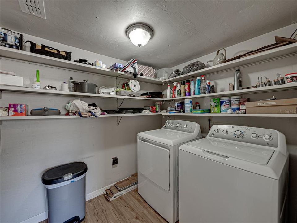 Laundry room with storage