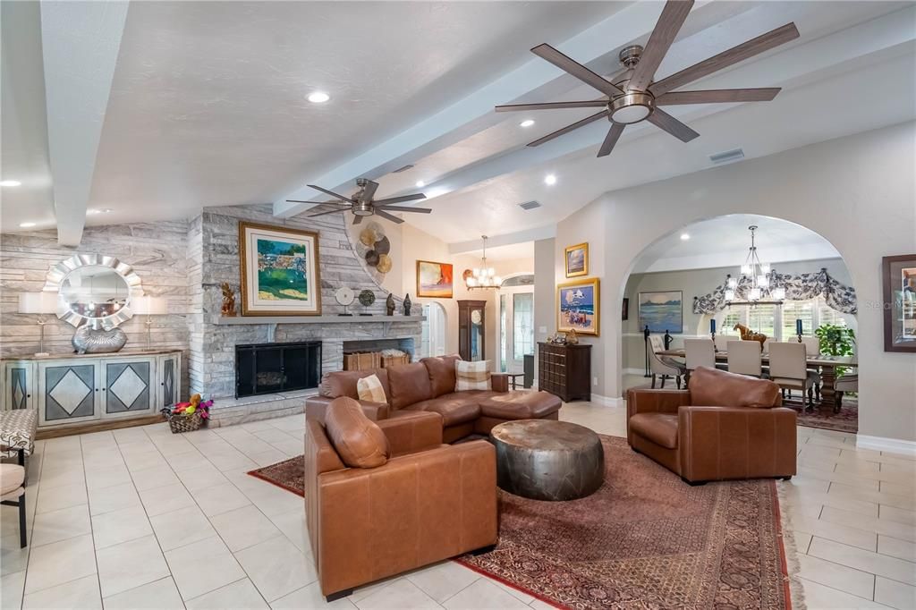 Wet bar to fireplace and foyer