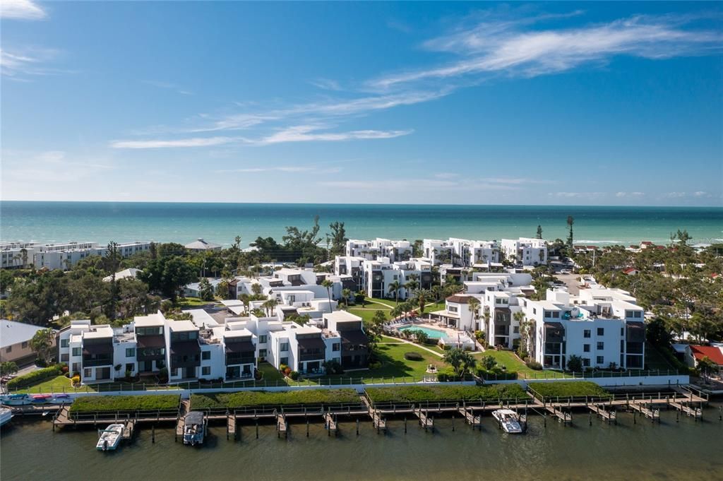 Aerial View of The Tamarind Complex from Lemon Bay with the Gulf of Mexico in the Background.  Boat Slip Awaits