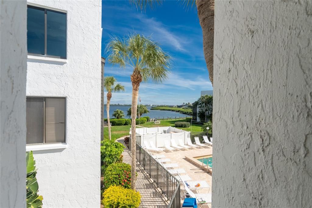 Peek a Boo from Your Kitchen Window of the pool and bay.