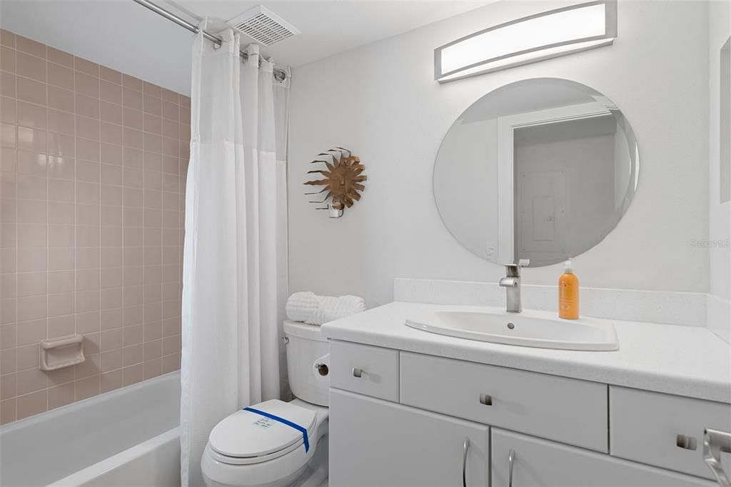 Guest bathroom with new vanity and toilet