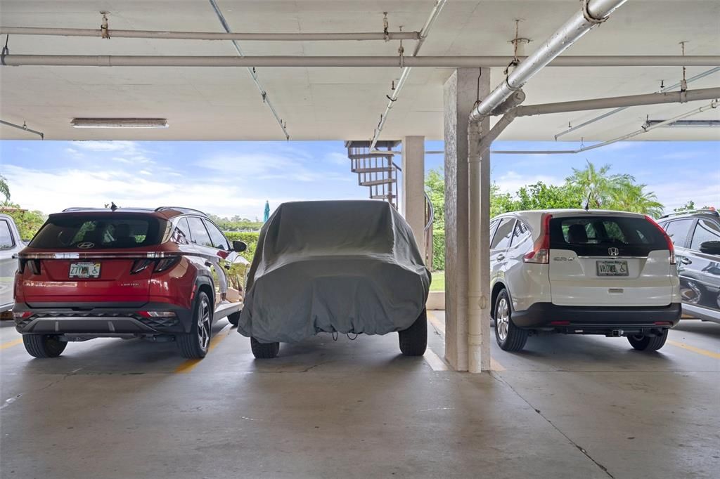 Under building parking #57 (covered car)