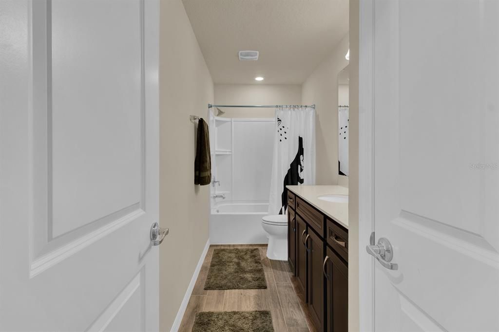 Upstairs Bathroom 4955 Royal Point Ave, Kissimmee, FL 34746 - Normalina Martin, Licensed Broker - The Opulent Group