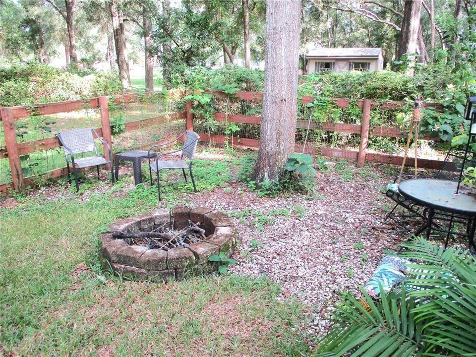 additional fenced area & fire pit