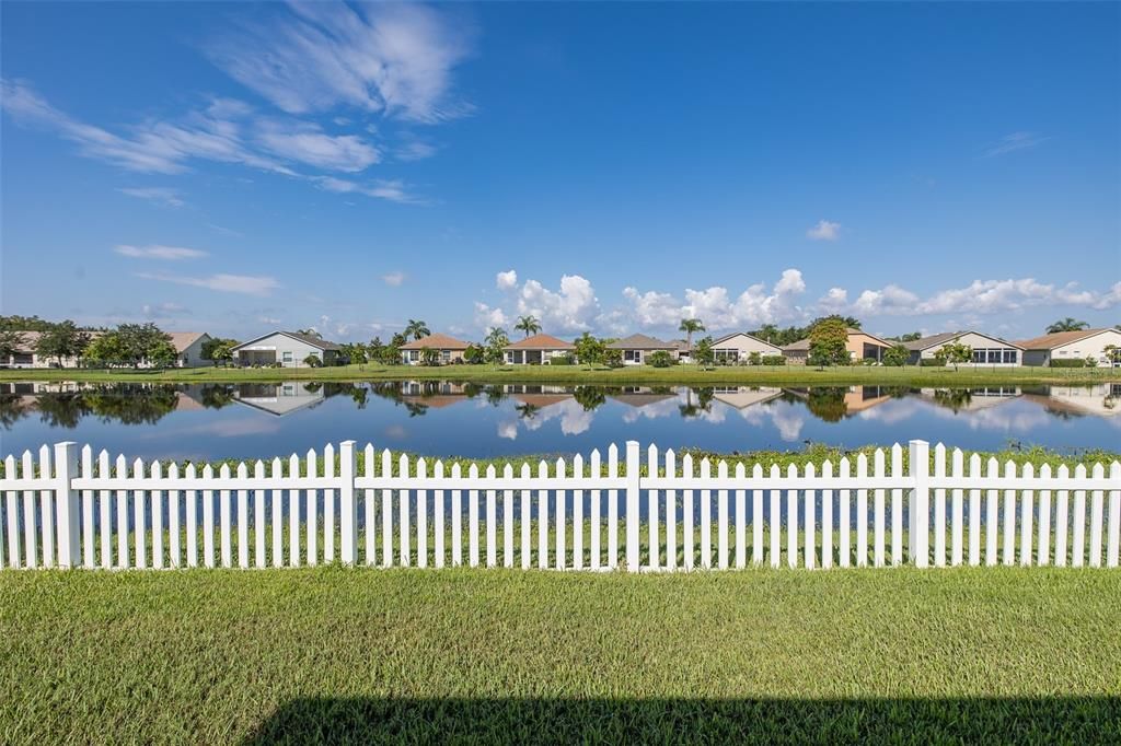 Backyard overlooking serene pond