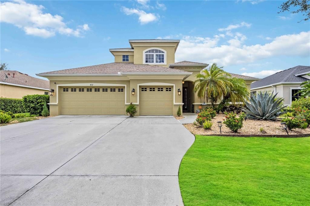 Meticulously maintained landscaping in front of home creating great curb appeal for the residence.