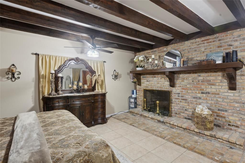 Master Room showing wood burning fireplace