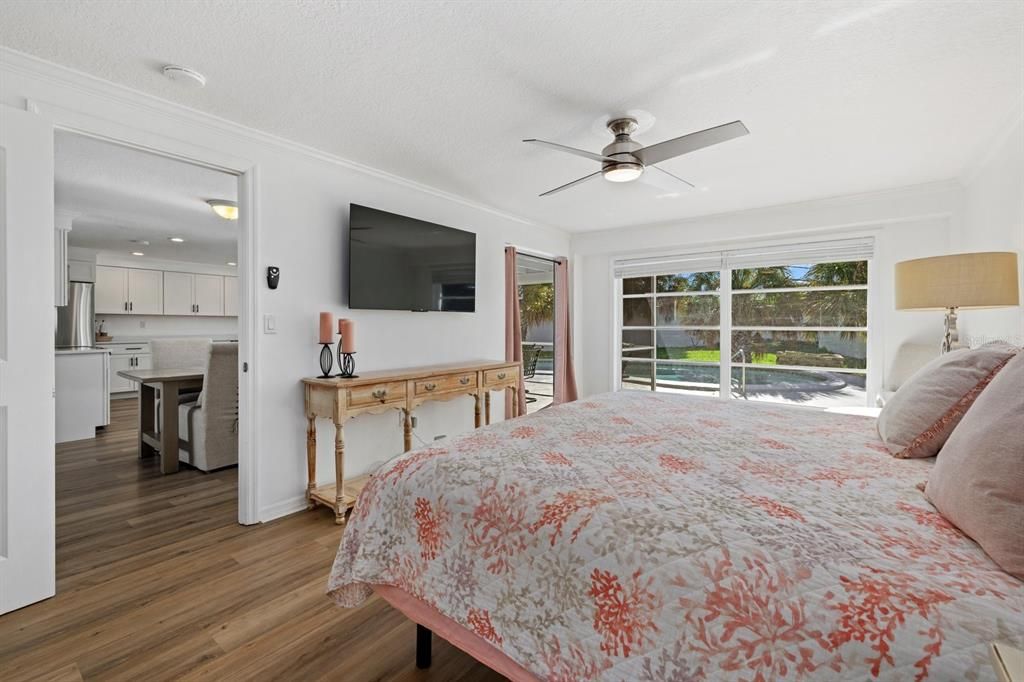 Primary/master bedroom with slider to patio.