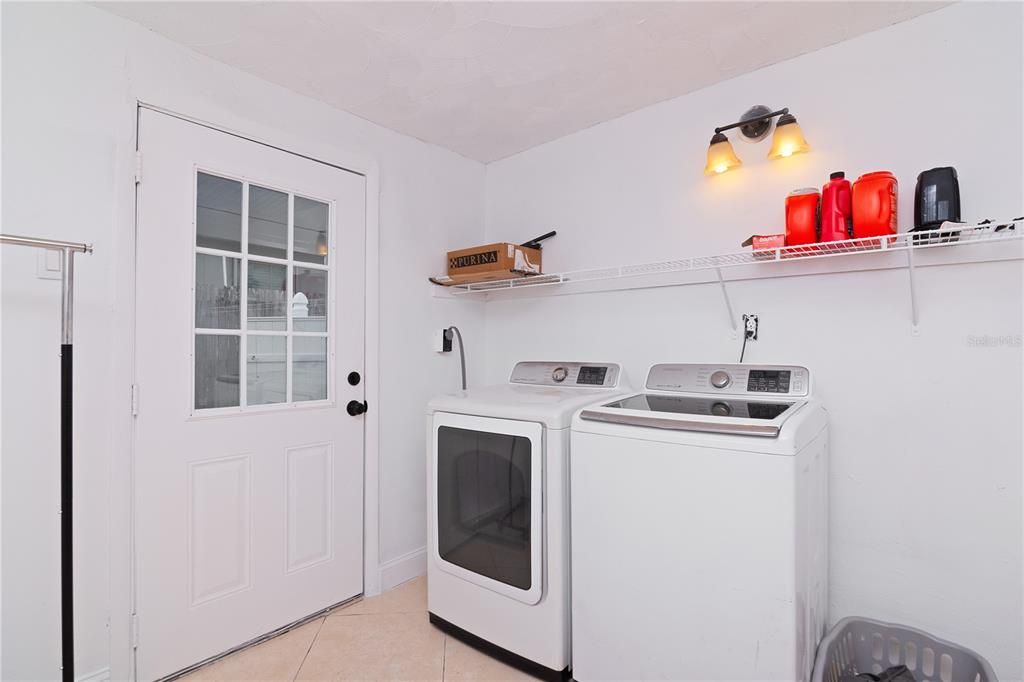 Laundry room with access to side & backyard