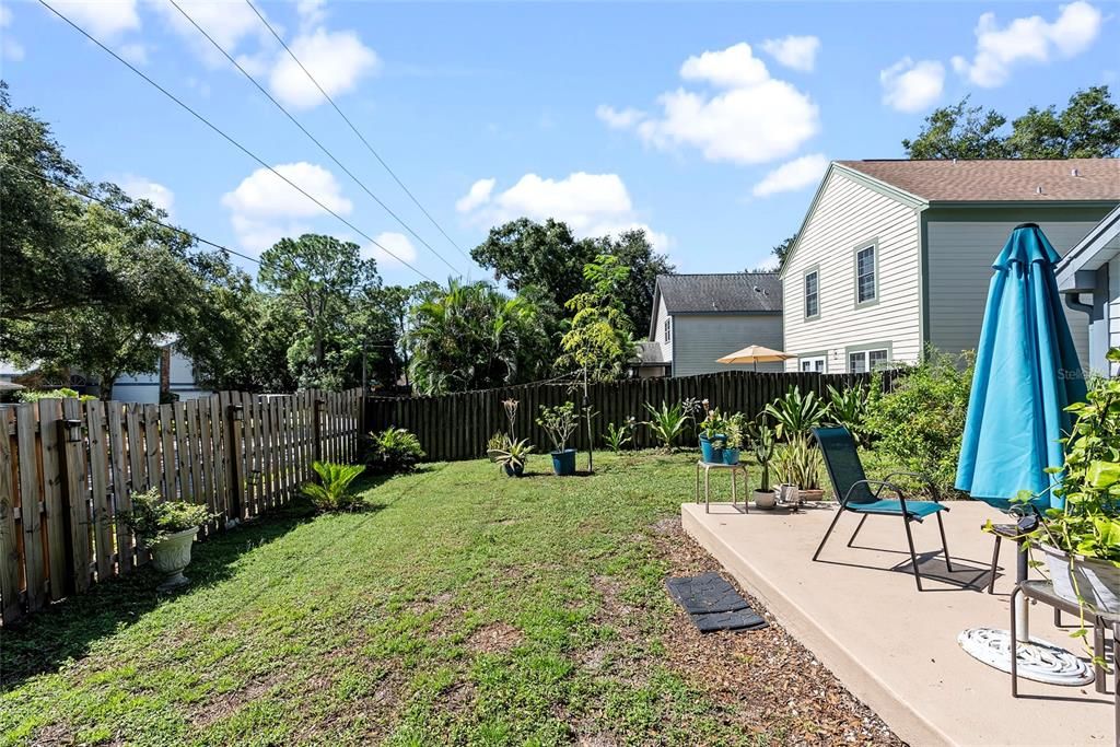 Spacious yard with plenty of room for pets, a garden, or creating your own outdoor oasis