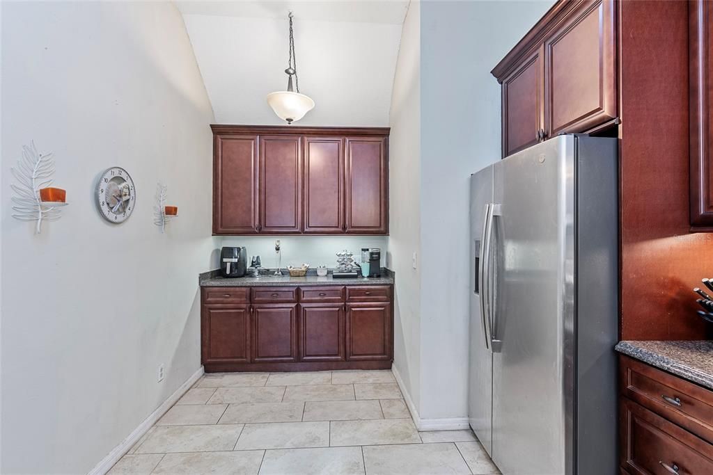 Coffee Station and additional cabinets at the back of the kitchen