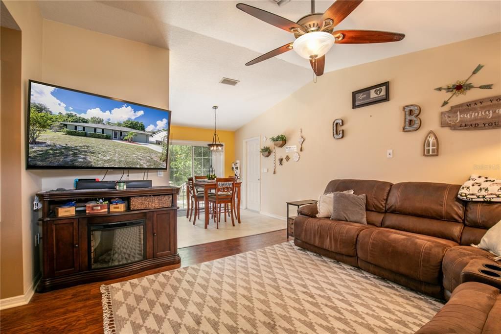 Open to the dining area and back patio creates even more space for your enjoyment.