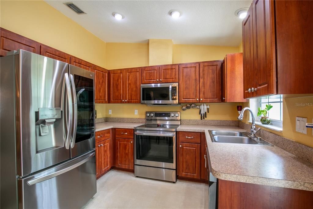 Kitchen has nice counter space for meal prep.