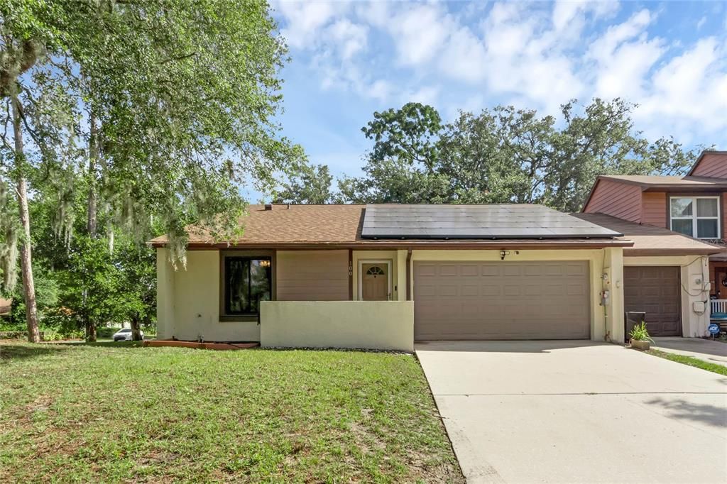 Minutes from SR 417 tucked away in the Hidden Lake Villas you will find this spacious SPLIT BEDROOM 2BD/2BA END-UNIT with OWNED SOLAR PANELS (to help keep your energy costs low!), a NEW ROOF (2022), NEW A/C (2023) and NEW WINDOWS (2020)!