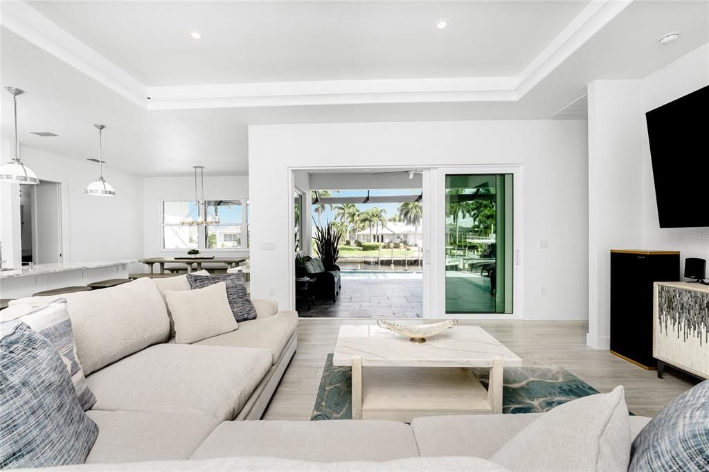 Living room with tray ceiling.