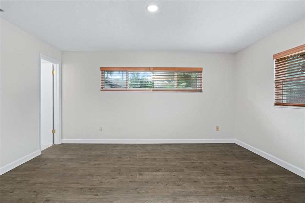 Primary Bedroom with a plethora of windows