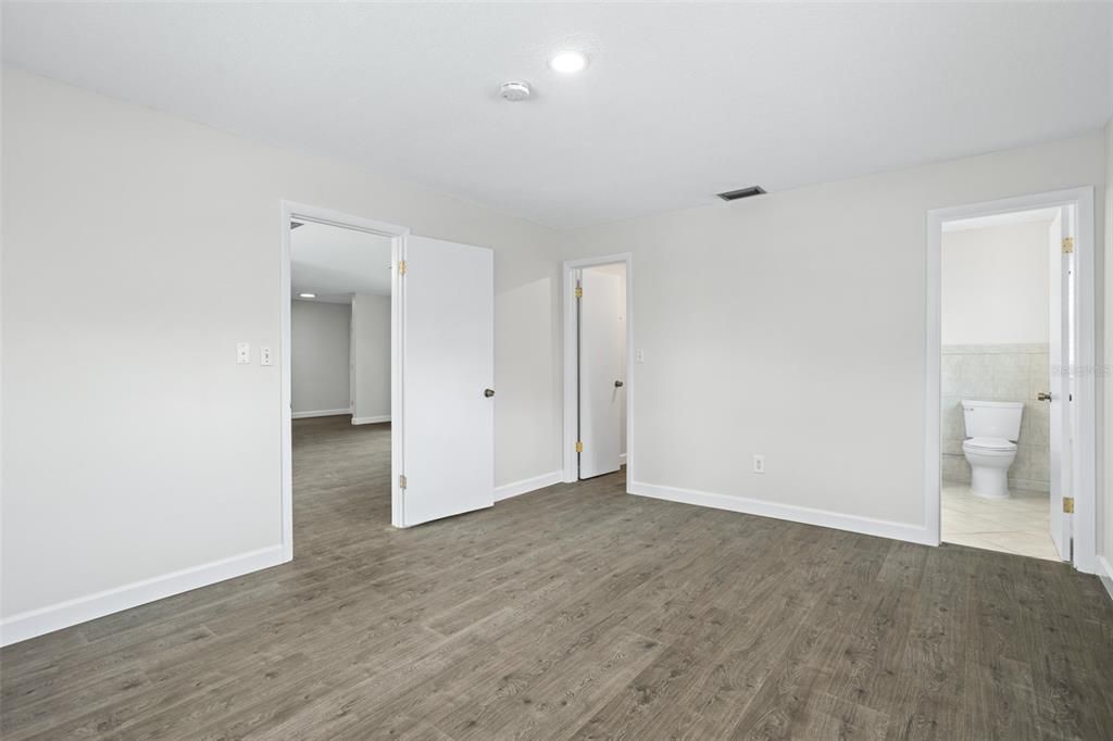 Primary Bedroom with walk in closet and en-suite bath