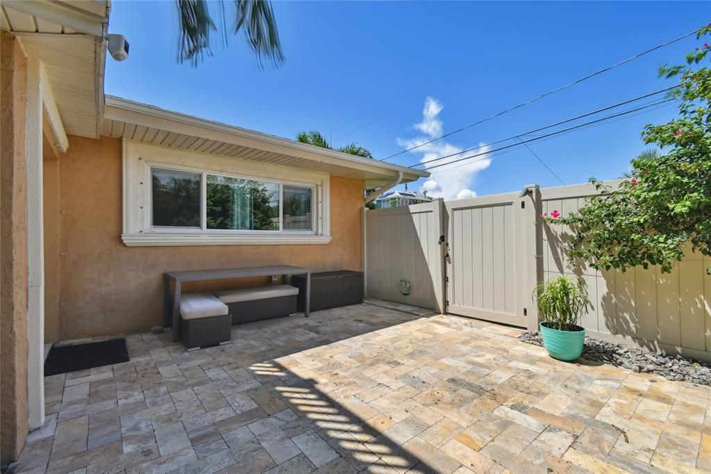 Patio perfect for fire pit and cocktail or outside eating. 3 ring camera and lights for safety.