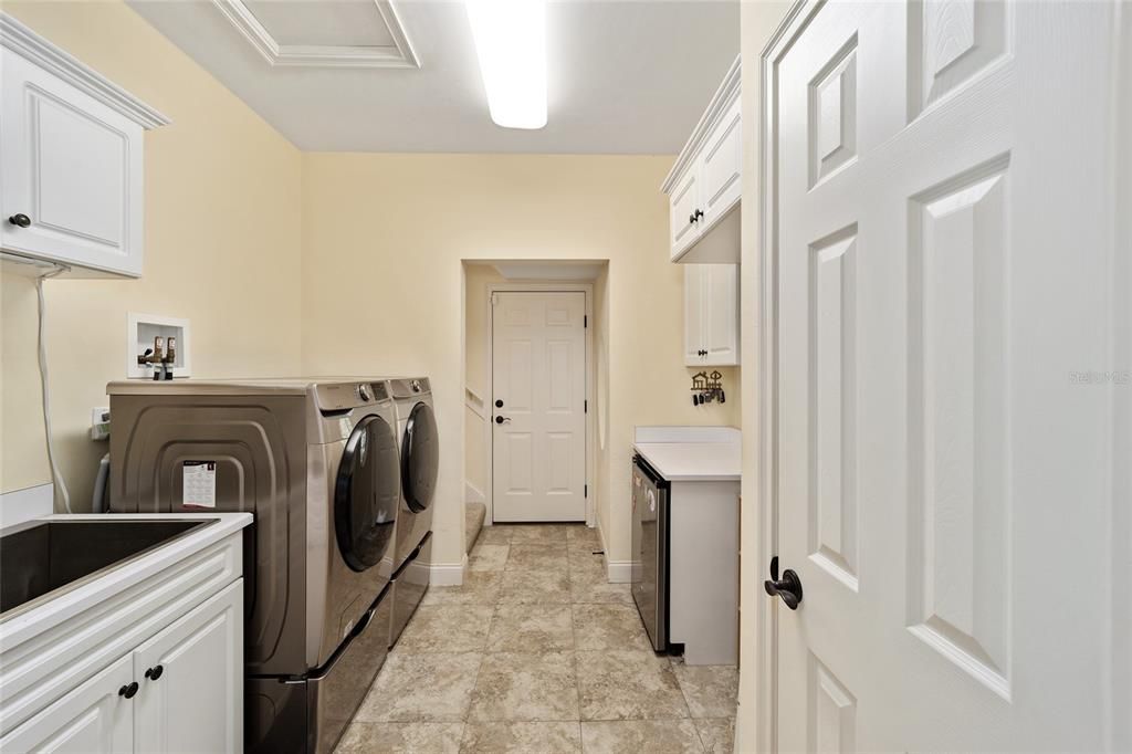 LARGE LAUNDRY WITH WASHER/DRYER AND UNDER COUNTER FRIG