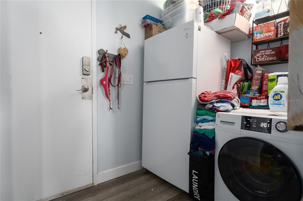 Full refrigerator and washer/dryer combo stay with your new home!