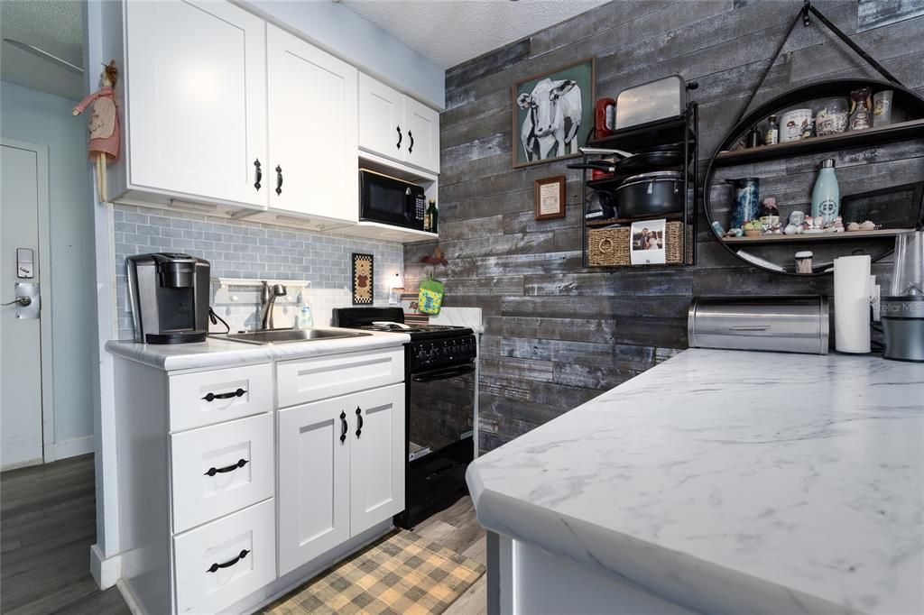 Fully remodeled kitchen. The full refrigerator is around the corner.